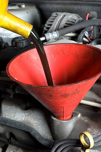 Car mechanic - engine oil change